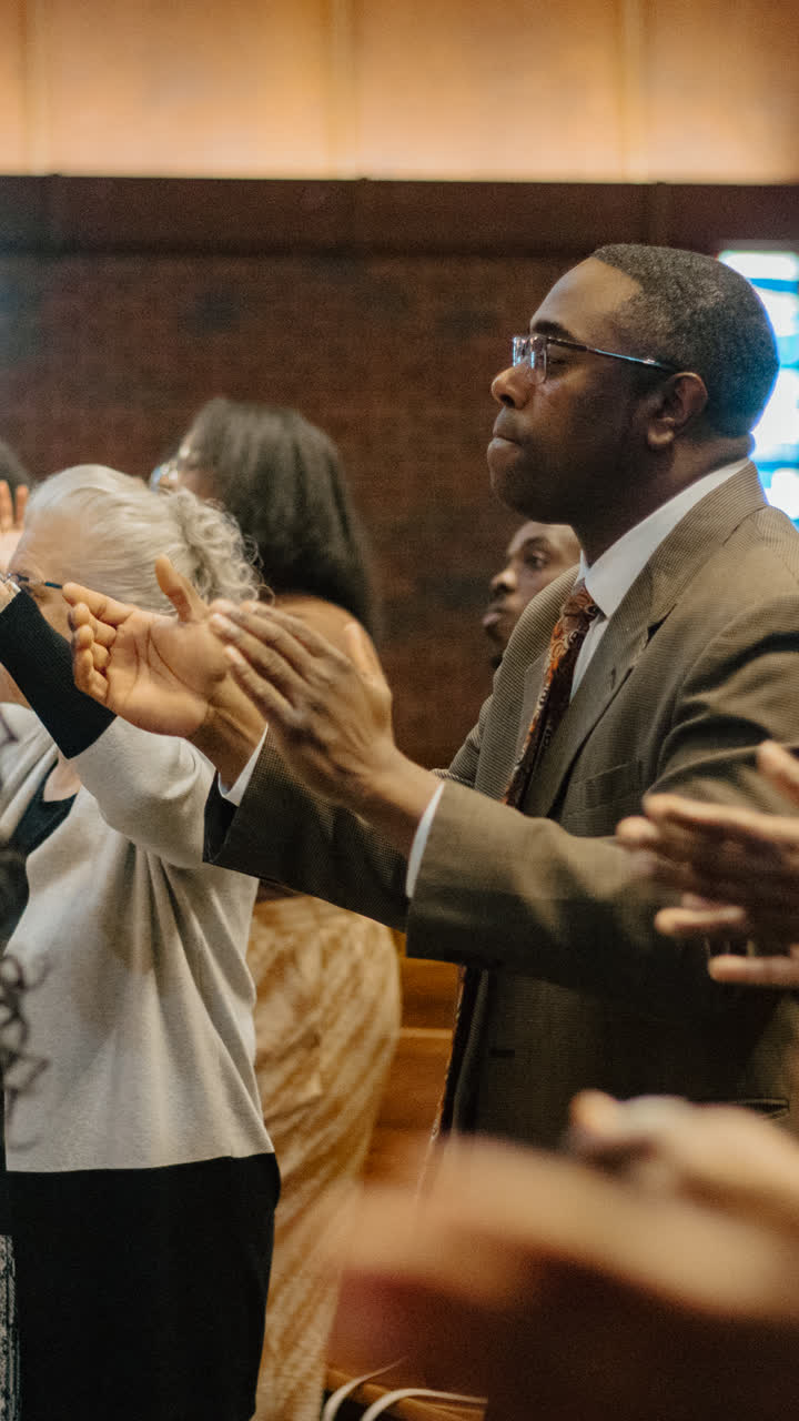 Laying on of hands in prayer