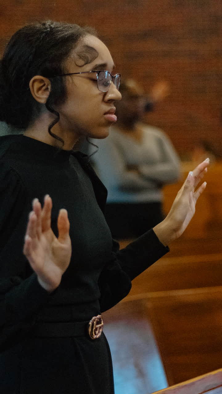 A young woman worshiping
